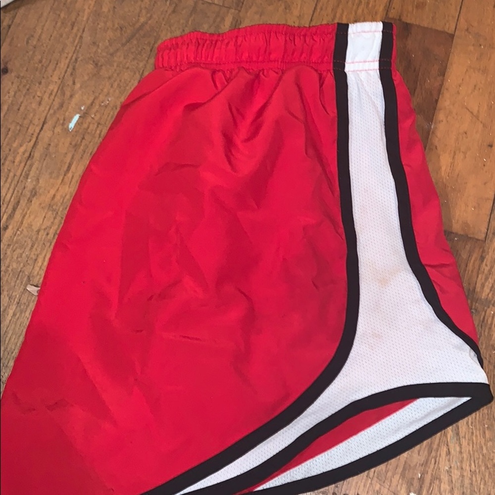 Red athletic Nike shorts